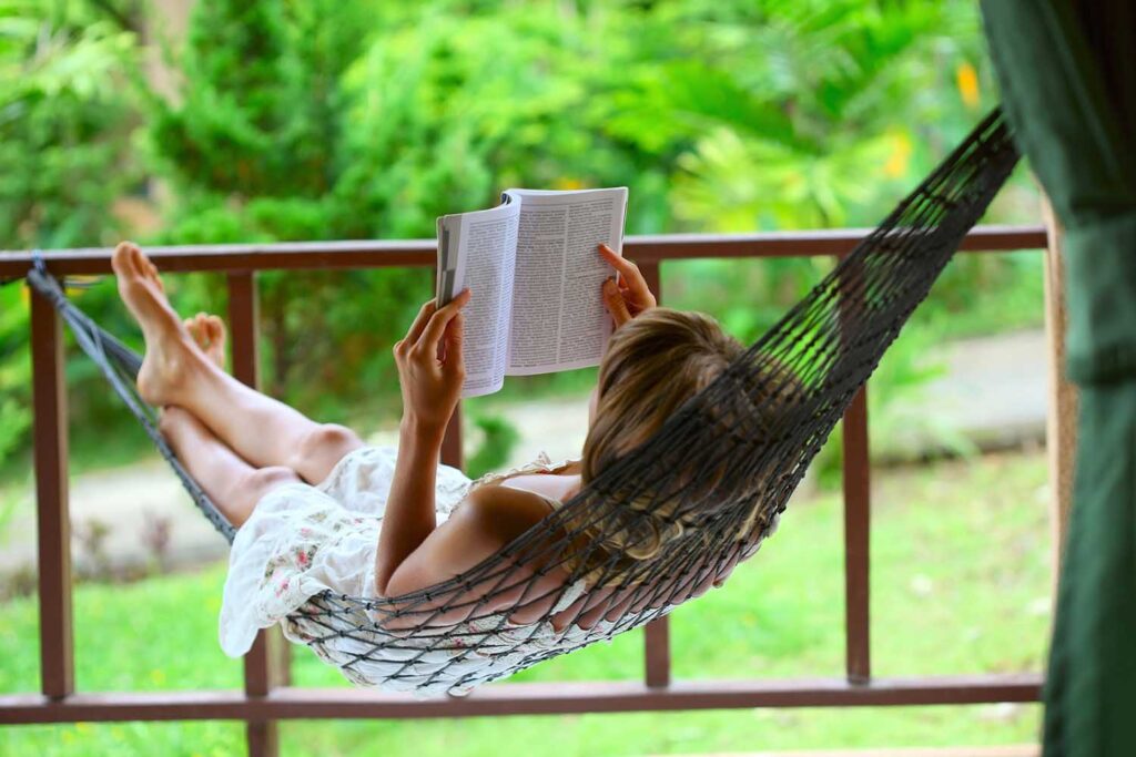 girl in hammock reading